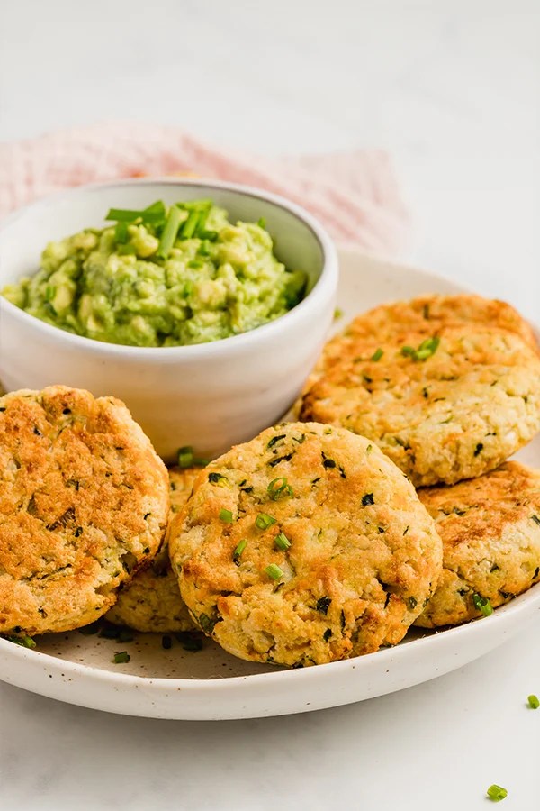 baked veggie nuggets on plate with guacamole