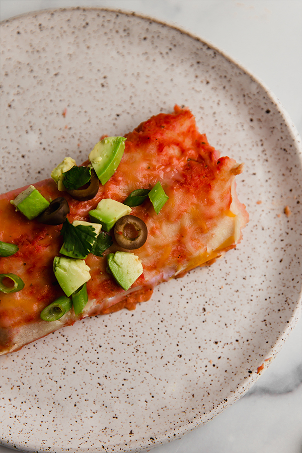 two enchiladas on a plate