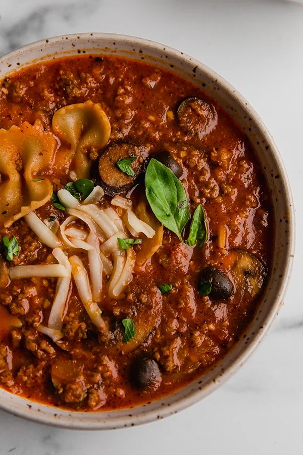 Pizza soup in a bowl.