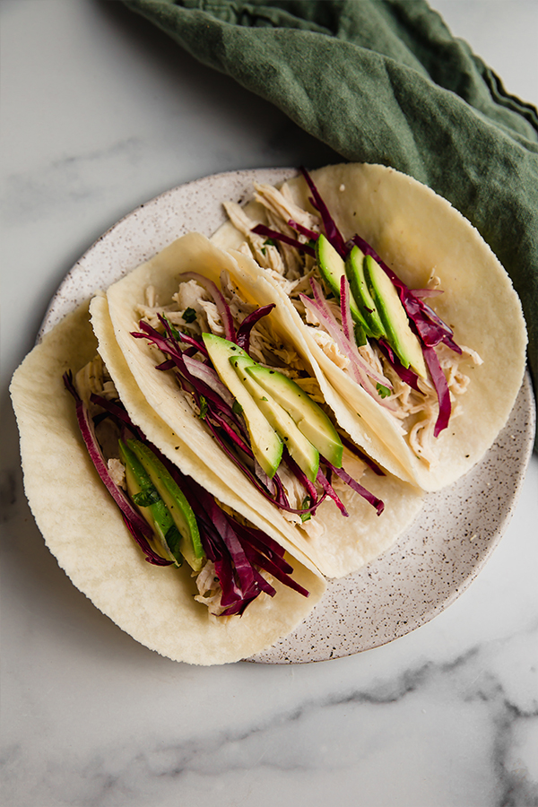 cilantro lime chicken tacos on plate