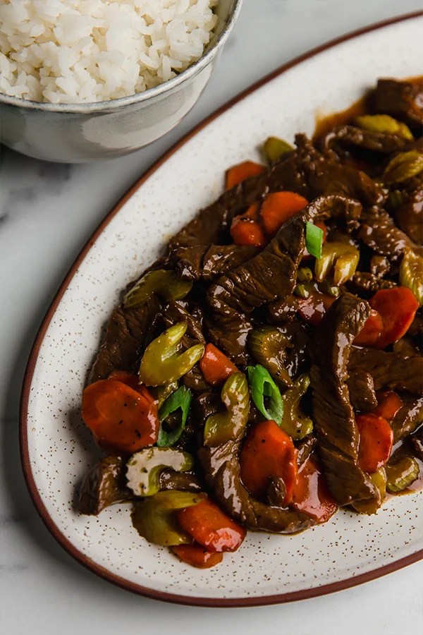 Platter of beef and celery stir fry.