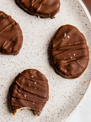 Chocolate-covered cookie dough Easter eggs on a plate.