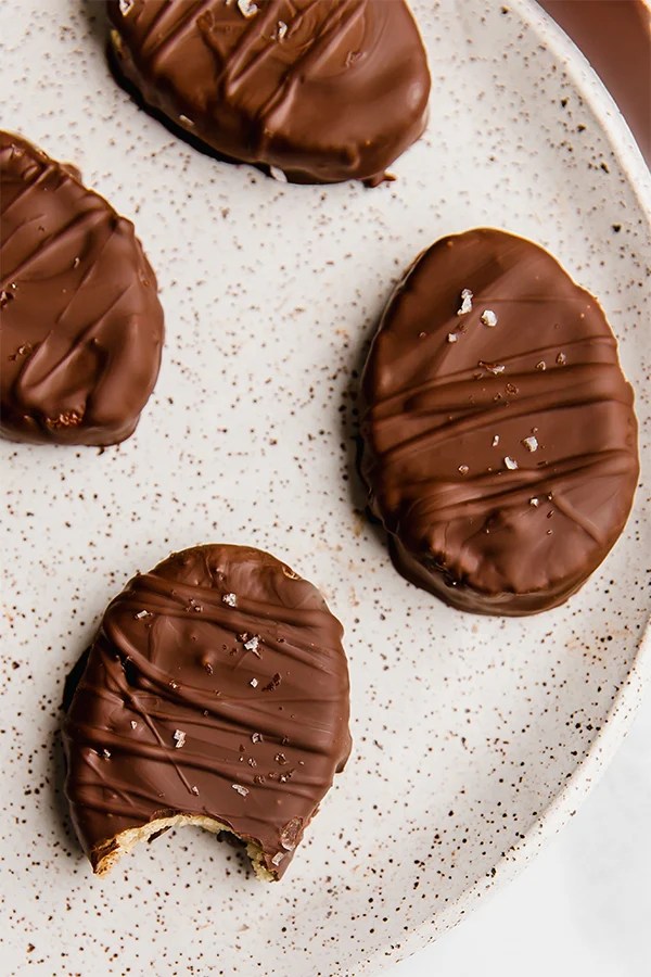 Chocolate-covered cookie dough Easter eggs on a plate.
