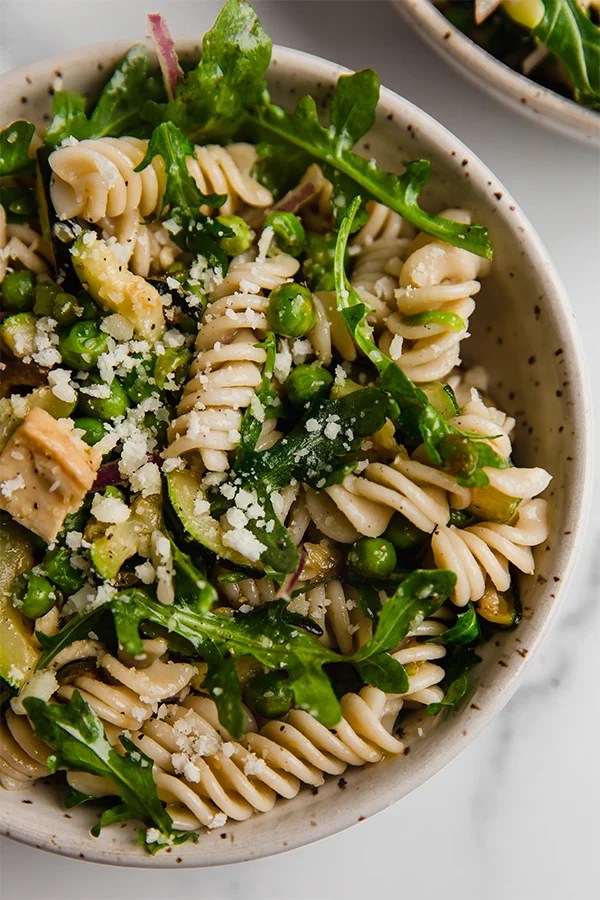 Spring pasta salad in a bowl.