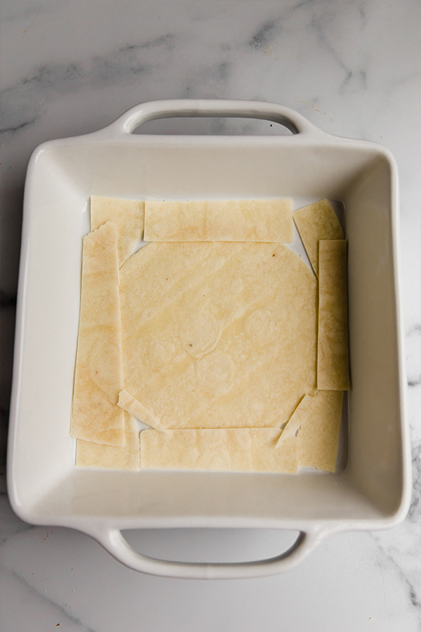 tortillas lining a baking dish