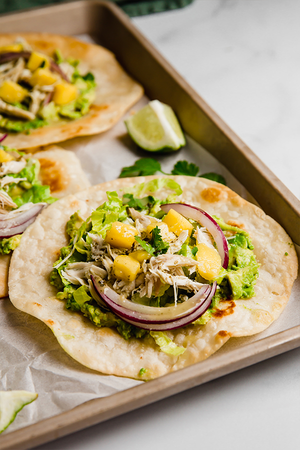 Tostadas assembled on a pan ready to eat