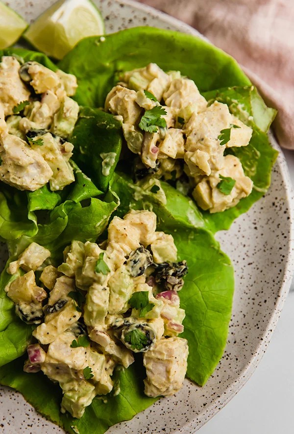 Yogurt curry chicken salad on lettuce.