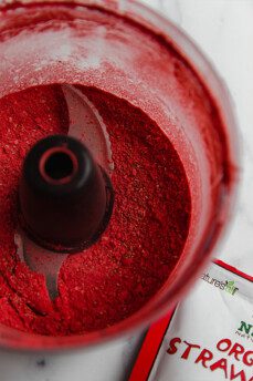 Powdered freeze-dried strawberries in a food processor.