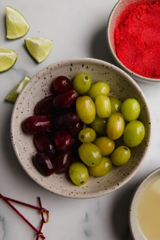 Grapes and other ingredients separated in bowls