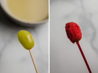 Grape with toothpick inserted ready to dip