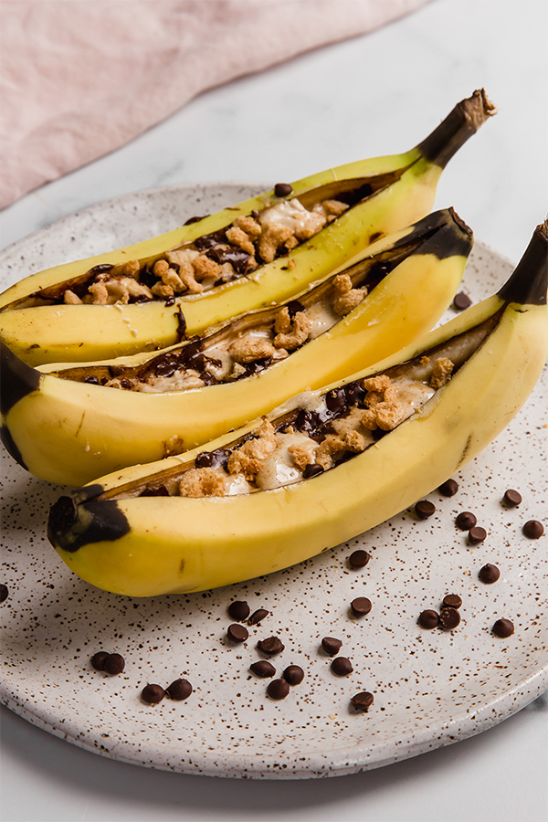 Campfire banana s\'mores on a plate.