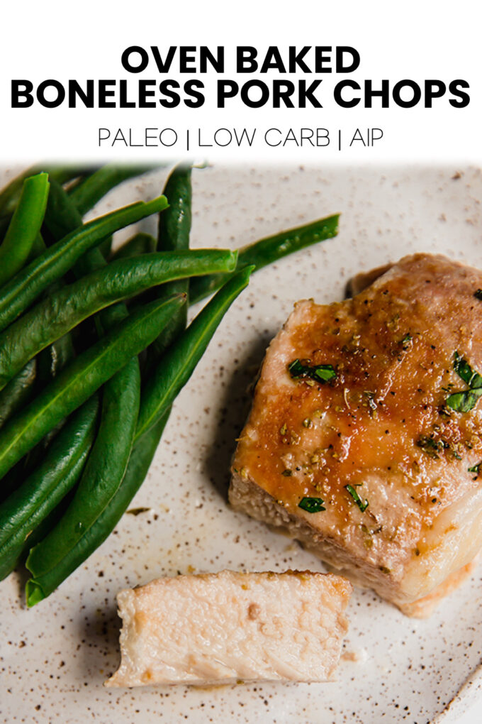 Plate of food with text \"Oven Baked Boneless Pork Chops Paleo | Low Carb | AIP.\"