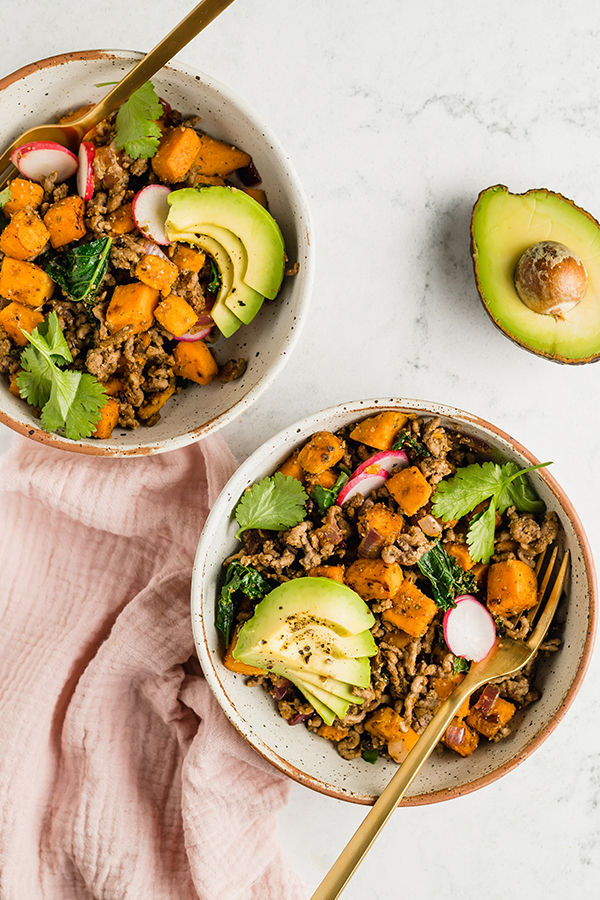Two bowls of Mexican-inspired breakfast skillet.
