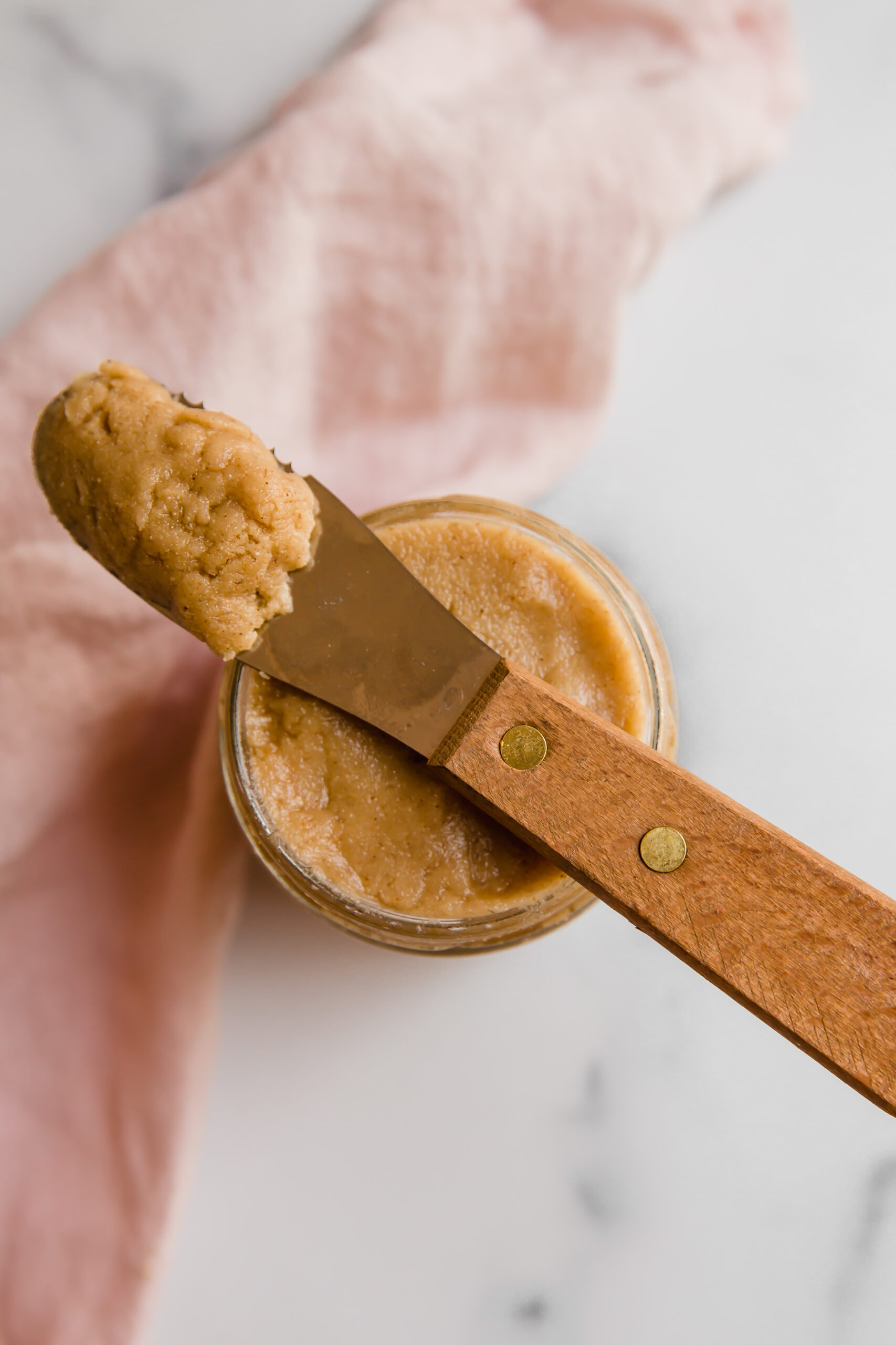 Tigernut butter on a knife.