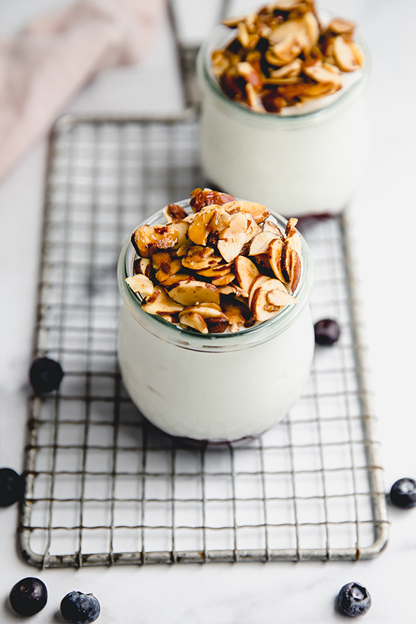Fruit-on-the-bottom yogurt jar topped with honey roasted almonds.