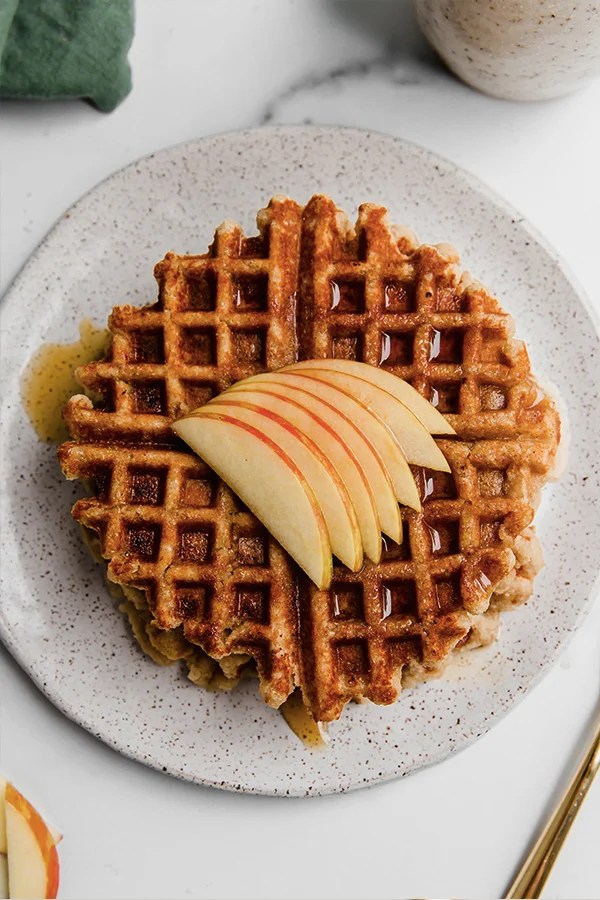 Apple slices on an apple waffle.