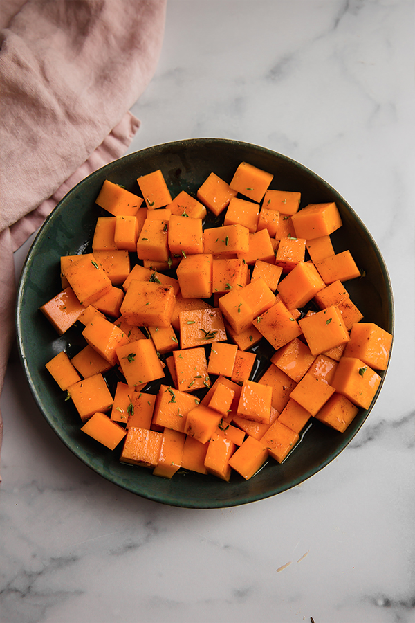 cubed butternut squash in a bowl