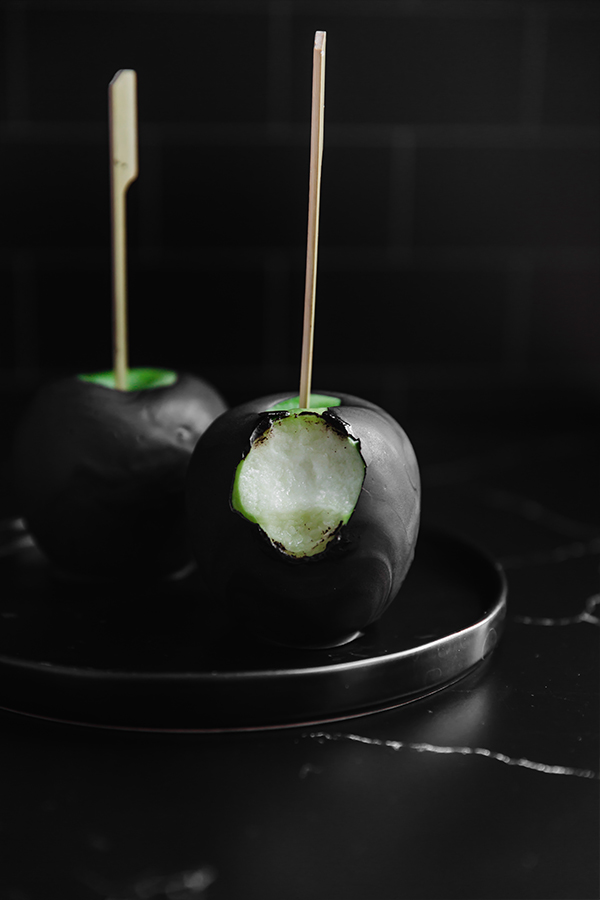Poison candy apple missing a bite.