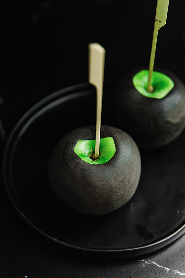 Two poison apples on a plate.