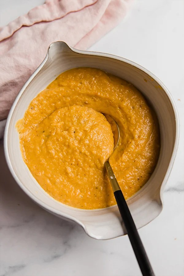 A bowl of butternut squash pasta sauce.