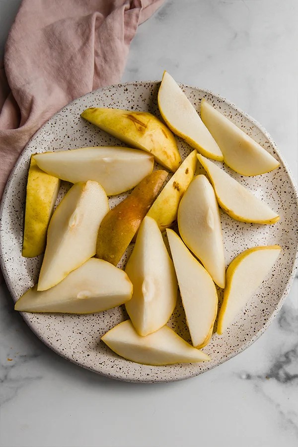A plate of sliced pears.
