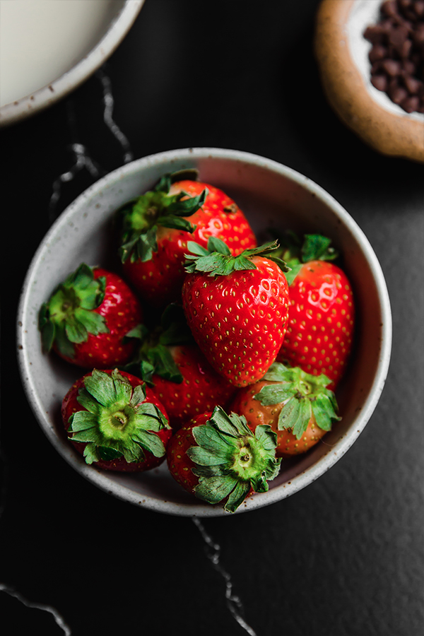 A bowl of strawberries.