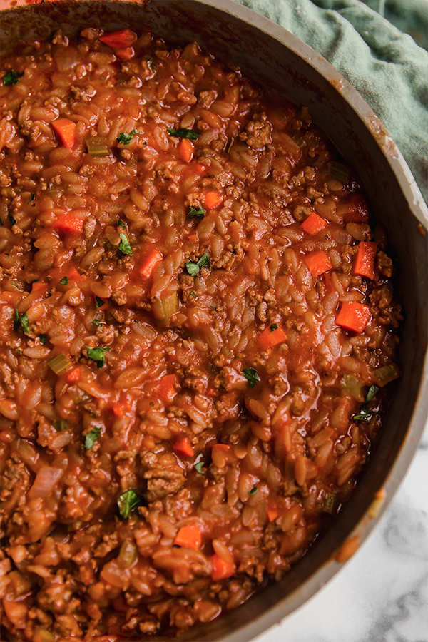A pot of orzo bolognese.
