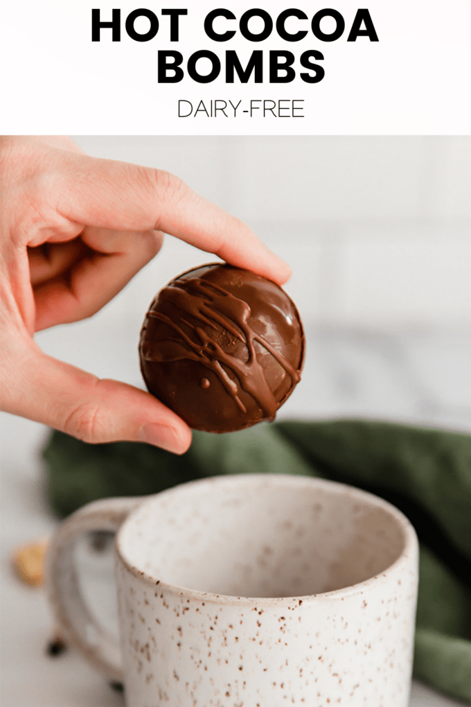 Person holding chocolate with text \"How Cocoa Bombs Dairy-Free.\"