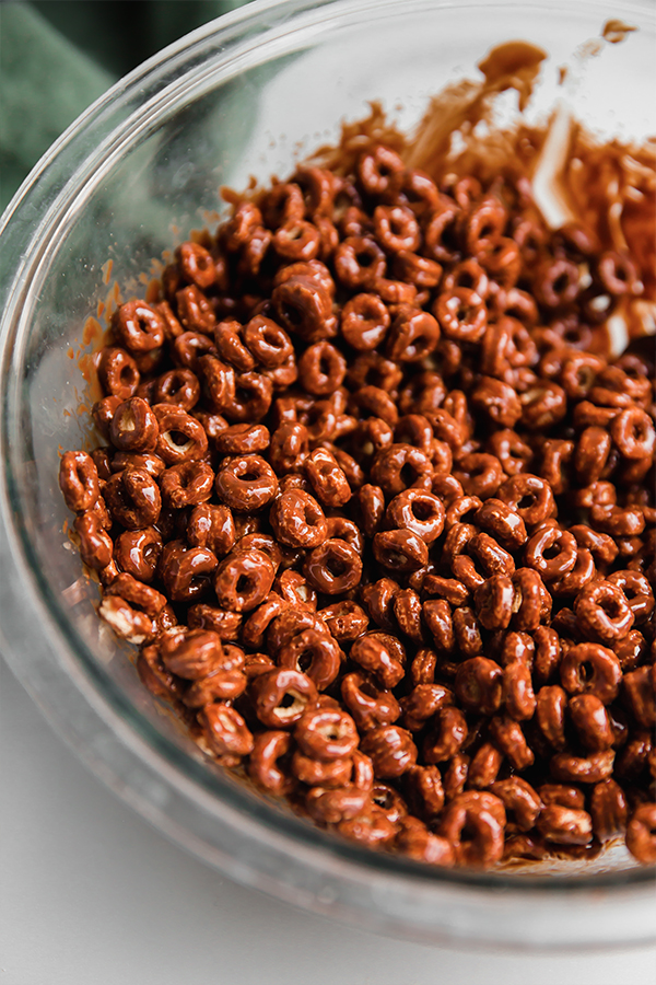 Bowl of chocolate-covered cereal.