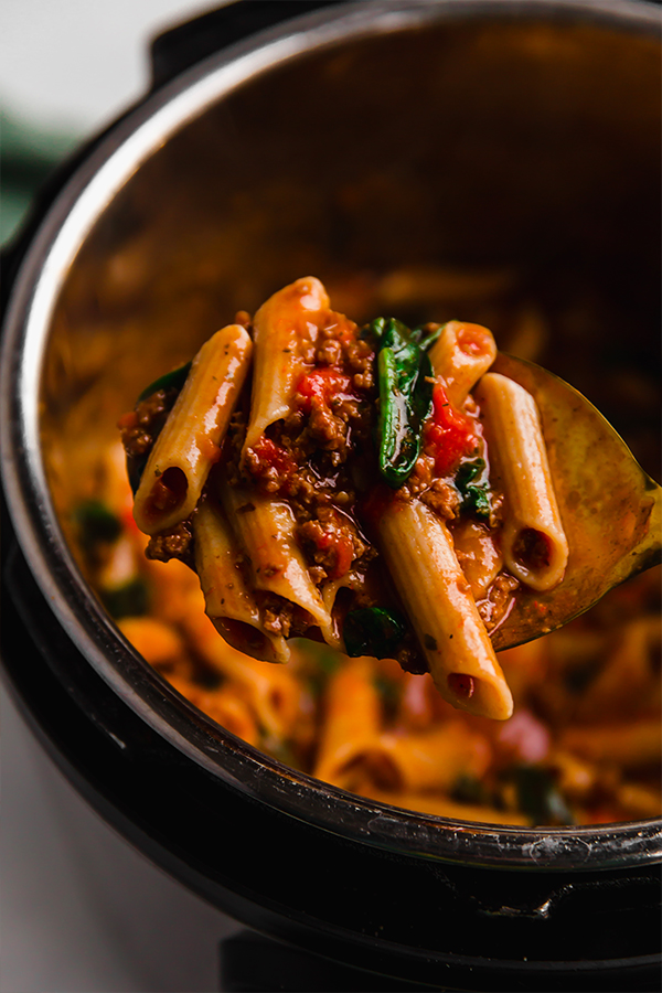 The finished dish spooning out of the Instant Pot.