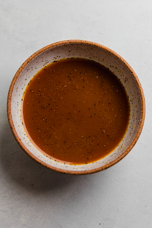 Bowl of coconut amino sauce.