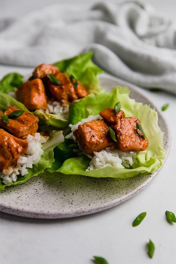 Plate of firecracker salmon lettuce cups.