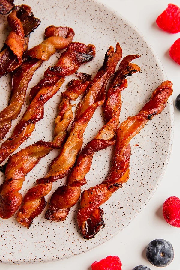 Oven bacon twists on a plate.