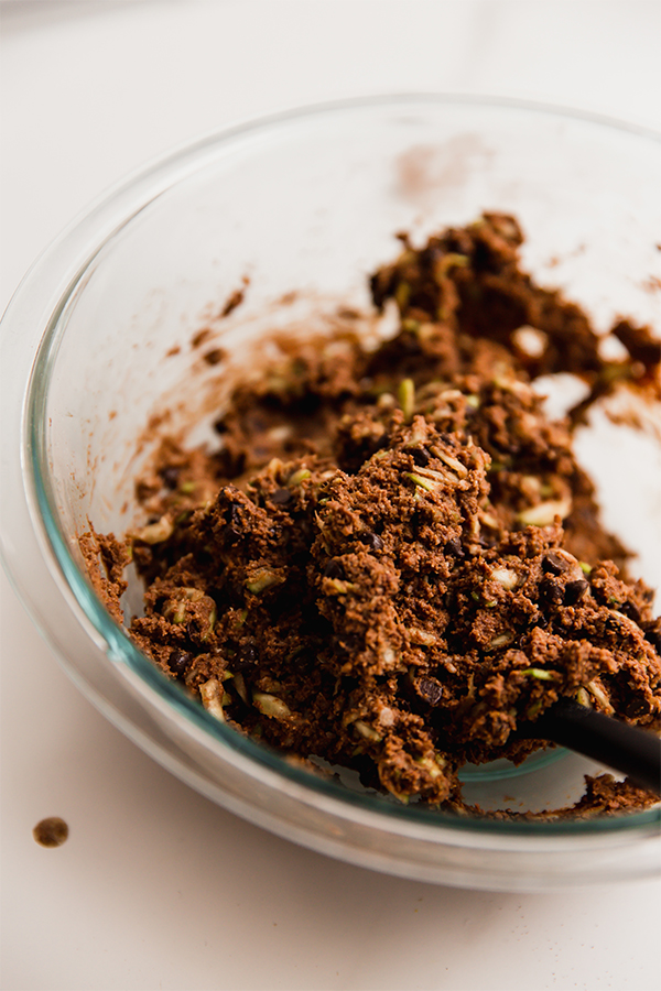 A bowl of chocolate zucchini muffins dough.