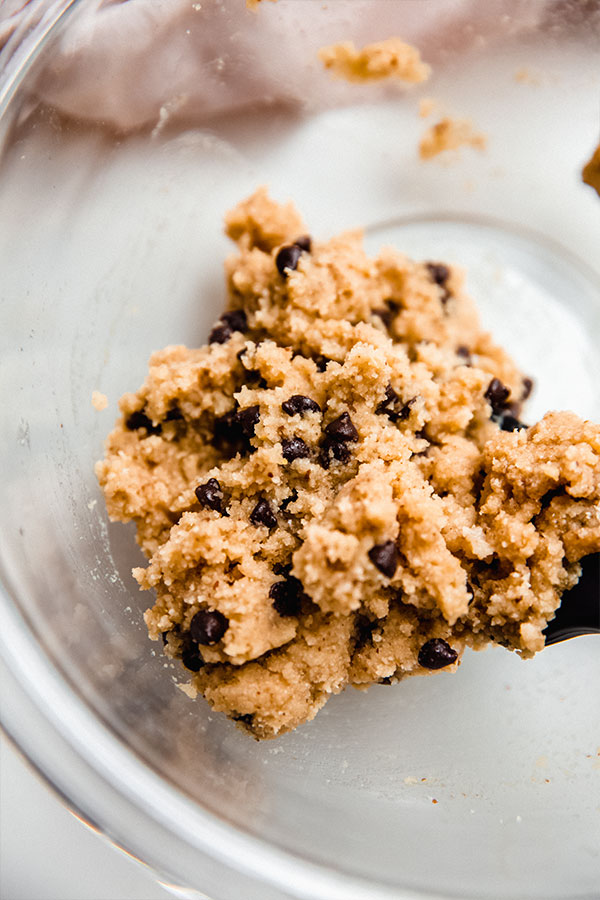 The chocolate chip cookie dough in a bowl.