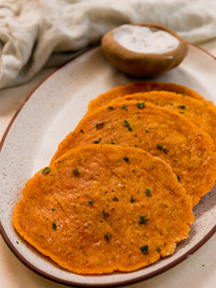 Sweet potato flatbread lined up on a plate.