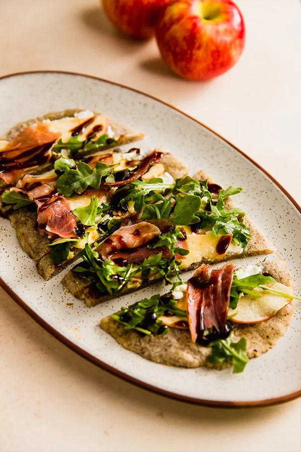 Apple balsamic flatbread on a platter.
