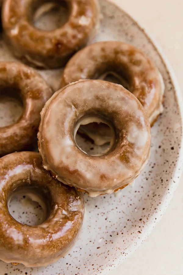 Apple cider donuts on a platter.