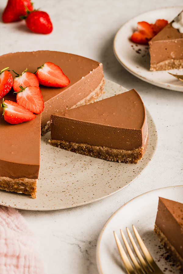 Chocolate pie with some slices missing.