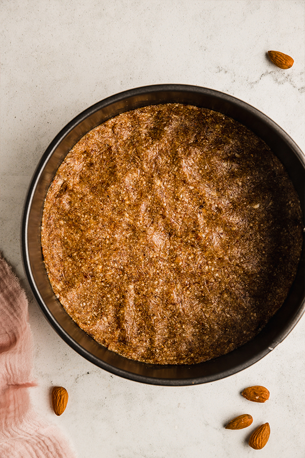 Pie crust pressed in a round pan.
