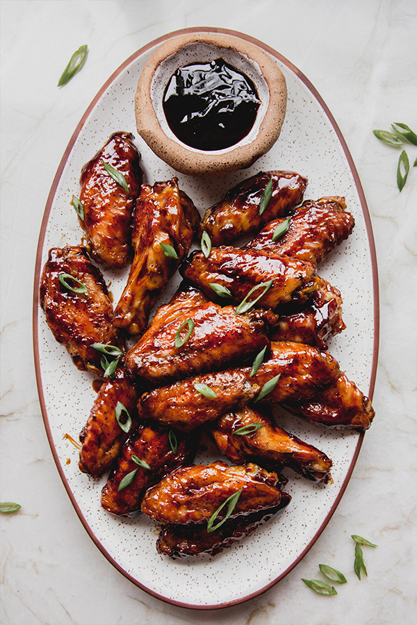 General Tso\'s style chicken wings on a platter.