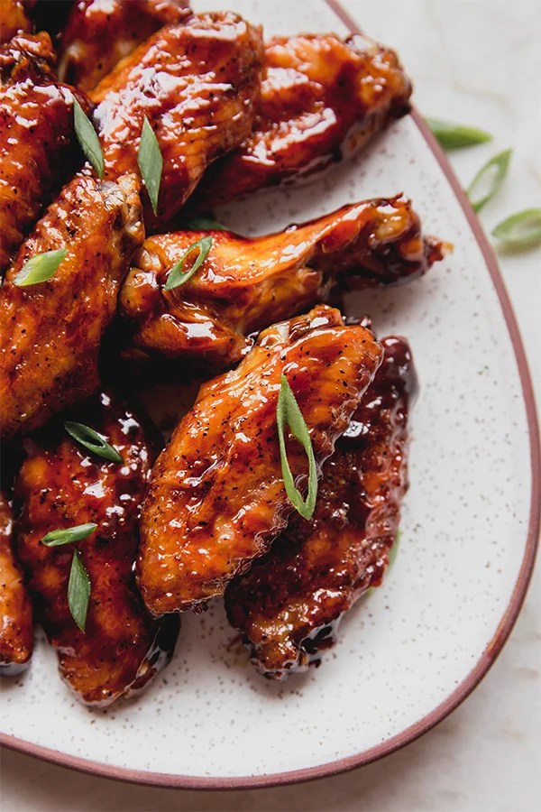 Plate of General Tso Asian chicken wings.