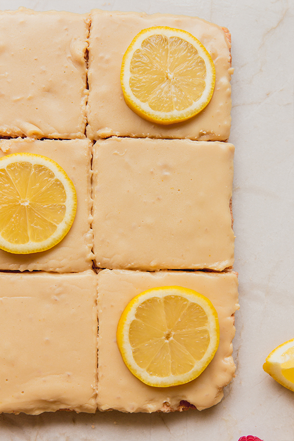 Lemon bars cut into squares.