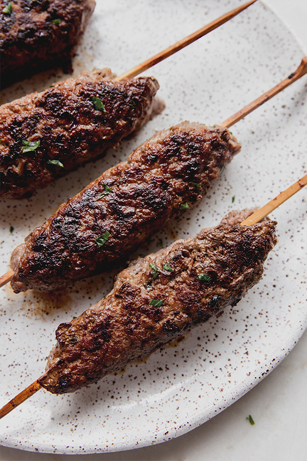 Beef kofta on a plate.
