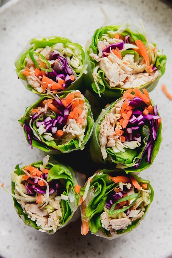 Colorful chicken and vegetable summer rolls.