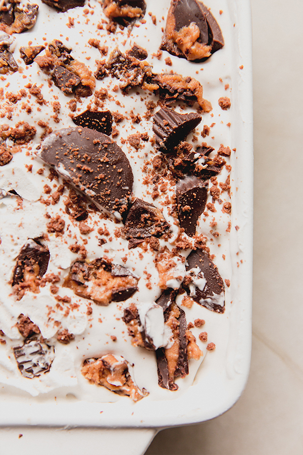 A close up photo of the ice box cake with crushed almond butter cup topping.