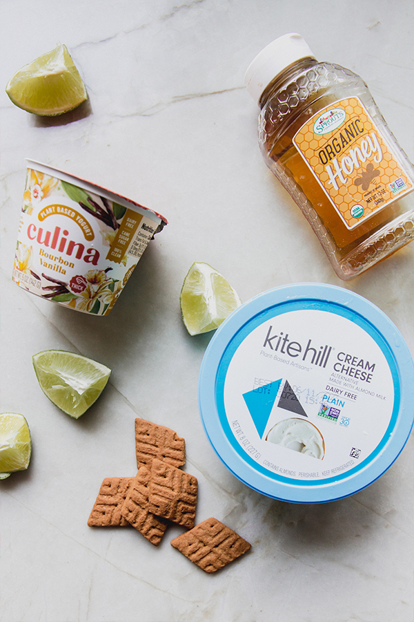 The ingredients for key lime pie dip on a counter.