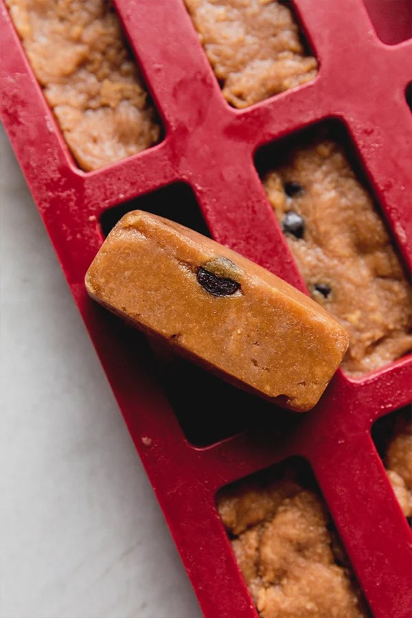 The cookie dough protein bars in the molds to shape them.