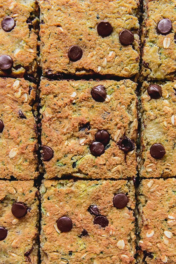 Zucchini banana breakfast bars cut into squares.