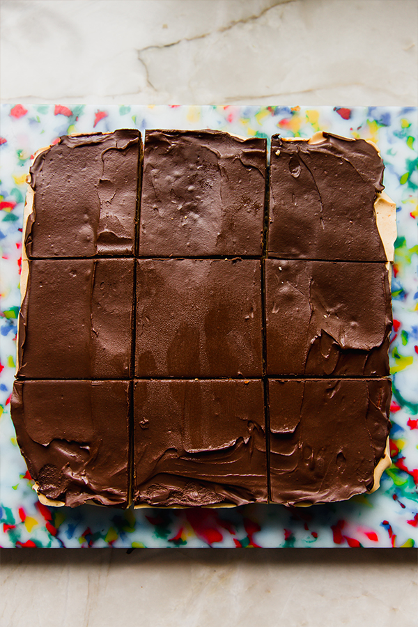 A full recipe of pumpkin spice s'mores sitting on the counter after being sliced.